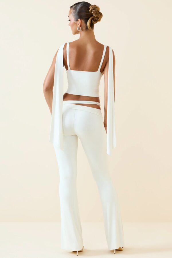 Petite Cut-Out Mid-Rise Flared Trousers in Vanilla - Image 2
