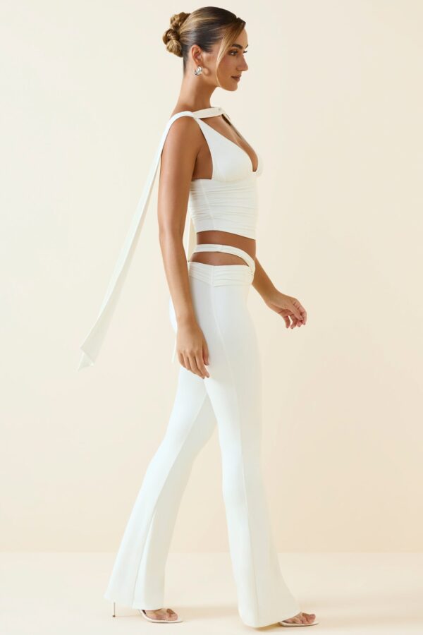 Petite Cut-Out Mid-Rise Flared Trousers in Vanilla - Image 3