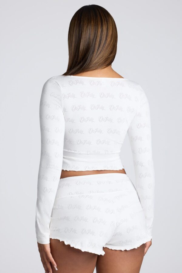 Long Sleeve Scoop Neck Pointelle Crop Top in White - Image 7