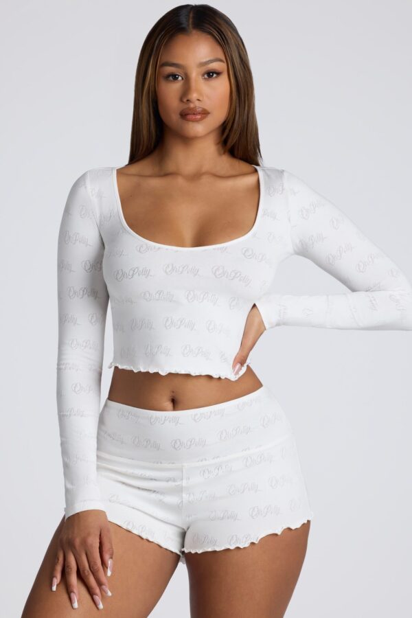 Long Sleeve Scoop Neck Pointelle Crop Top in White - Image 11