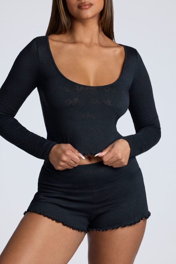 Long Sleeve Scoop Neck Pointelle Crop Top in Black - Image 7