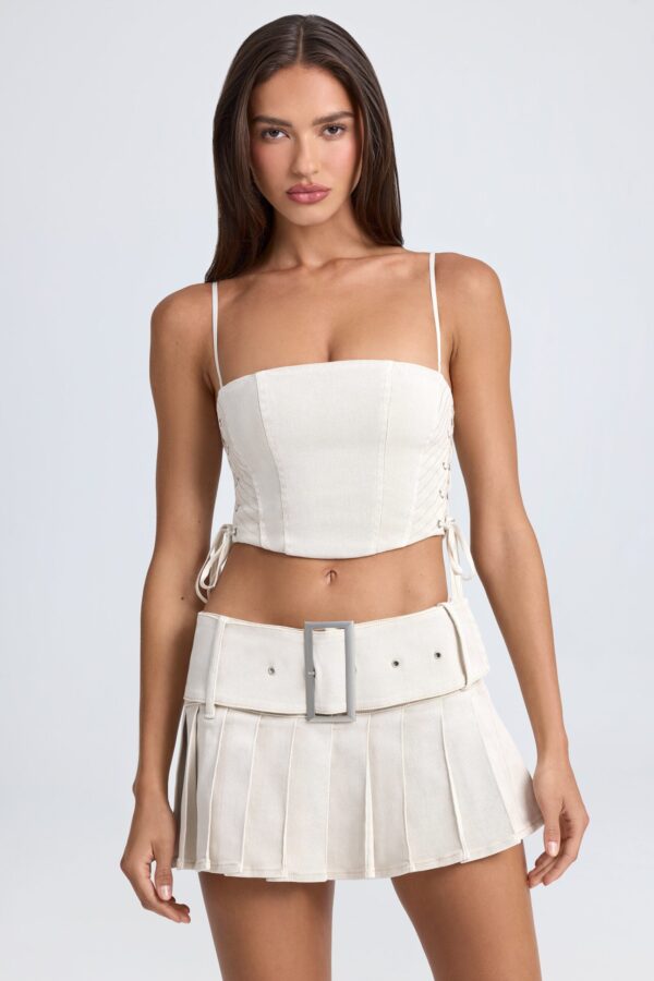 Belted Pleated Low-Rise Micro Mini Skirt in Ecru - Image 7