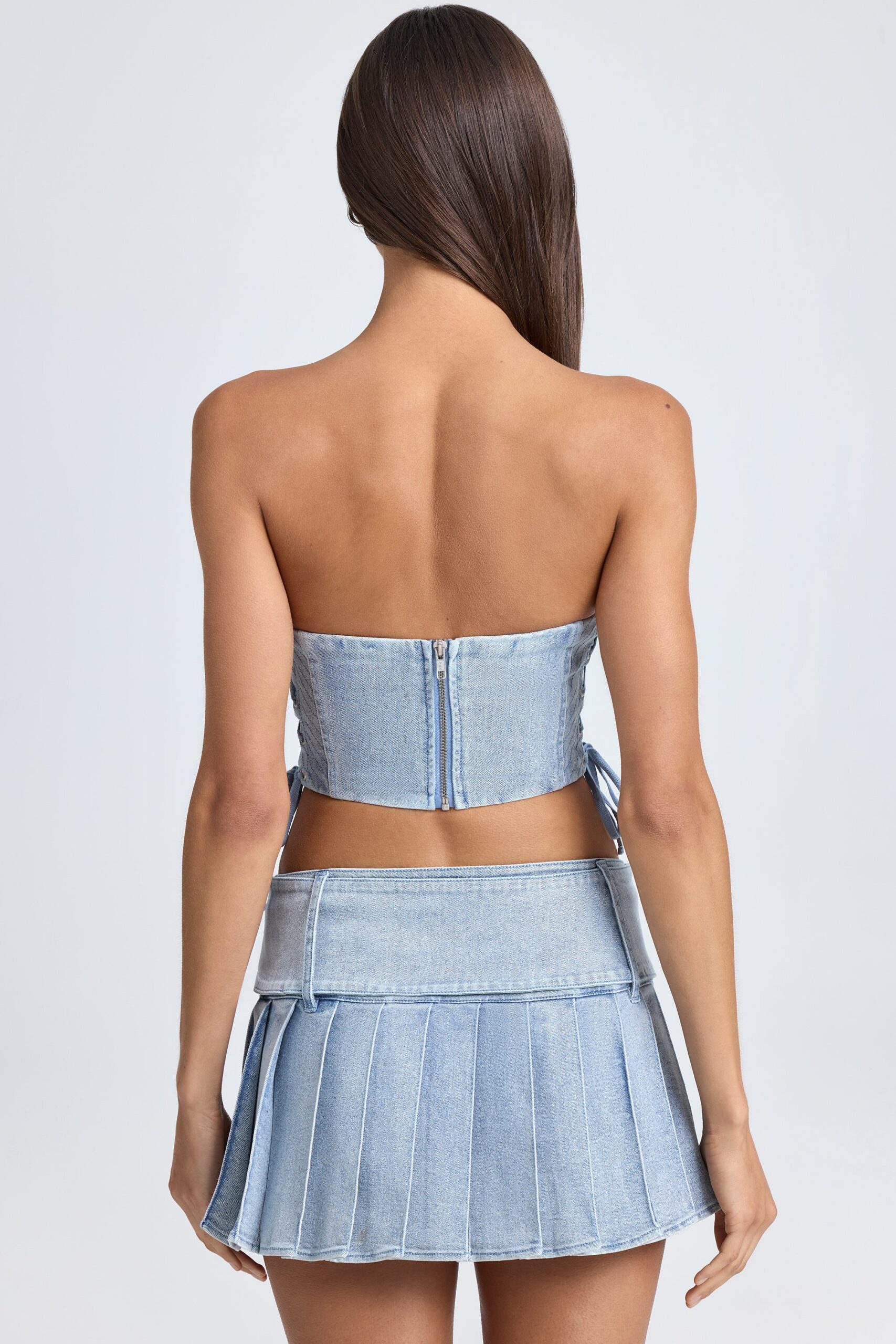 Belted Pleated Low-Rise Micro Mini Skirt in Light Blue Stonewash - Image 2