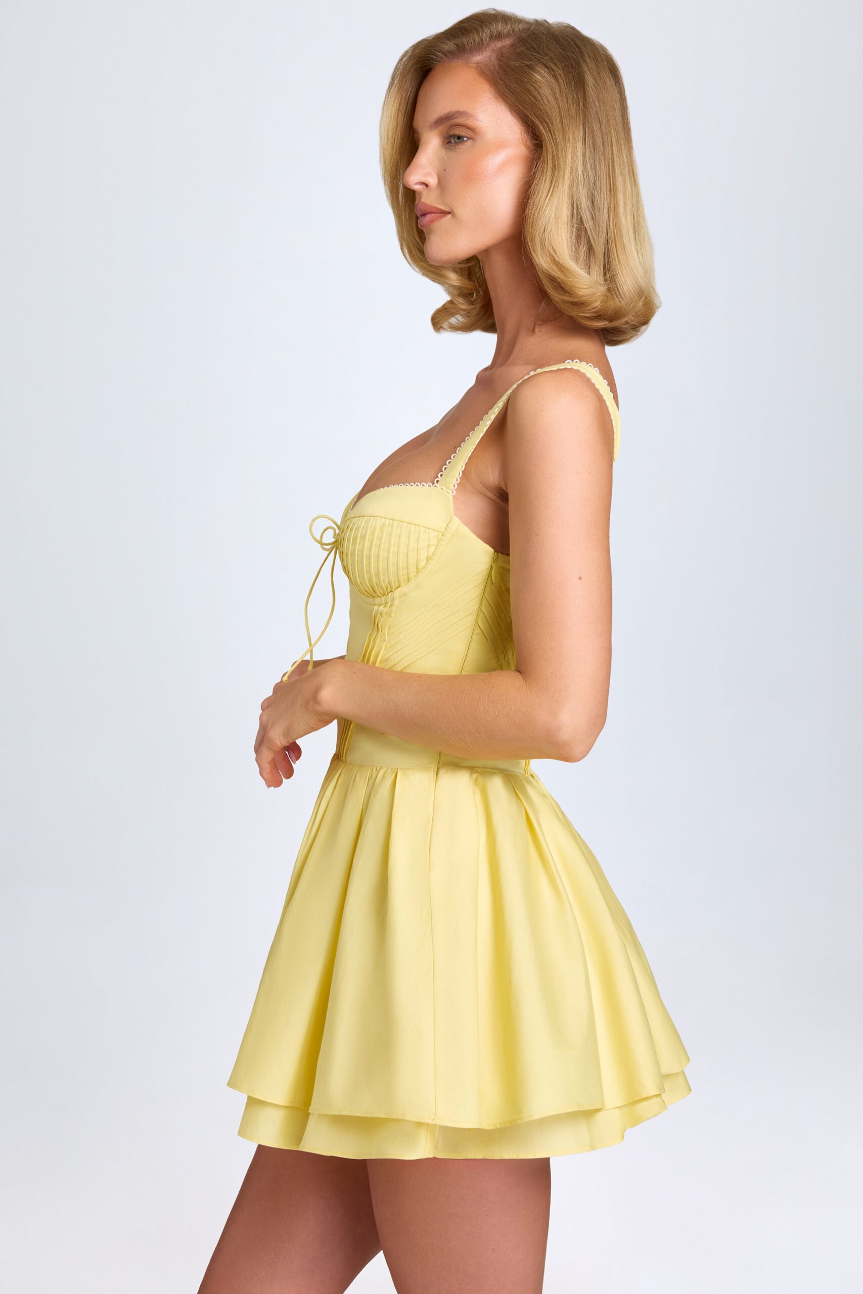 Pintucked Lace-Up Corset Mini Dress in Pastel Yellow - Image 4