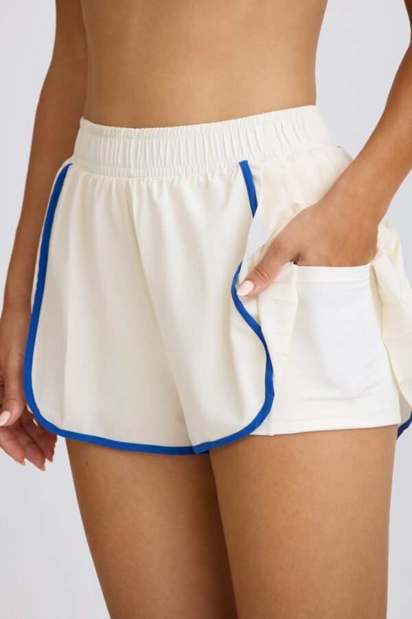 Pleated Mini Shorts in White - Image 4
