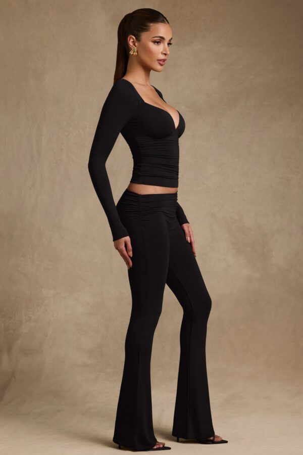Modal Asymmetric-Waist Flared Trousers in Black - Image 6