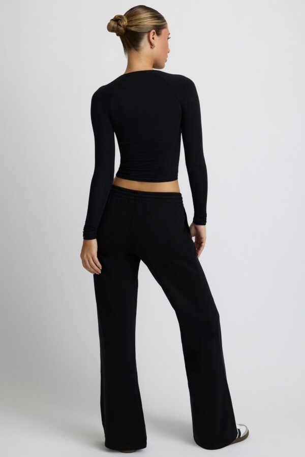 Low-Rise Wide-Leg Joggers in Black - Image 3