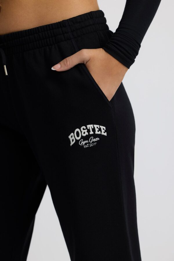 Low-Rise Wide-Leg Joggers in Black - Image 5