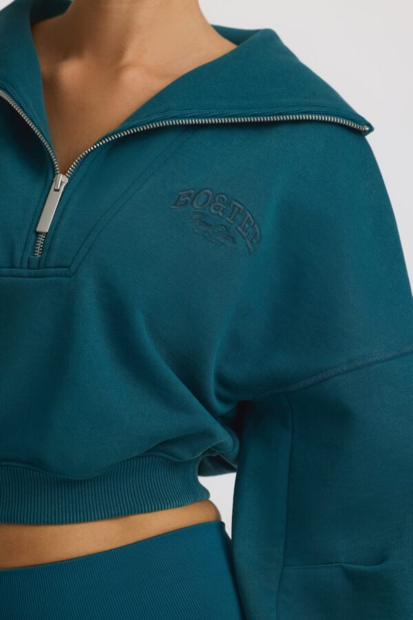 Quarter-Zip Cropped Sweatshirt in Teal - Image 6